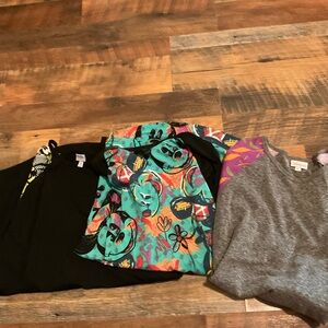 LuLaRoe Disney Graphic Apparel with Black and Green Accents